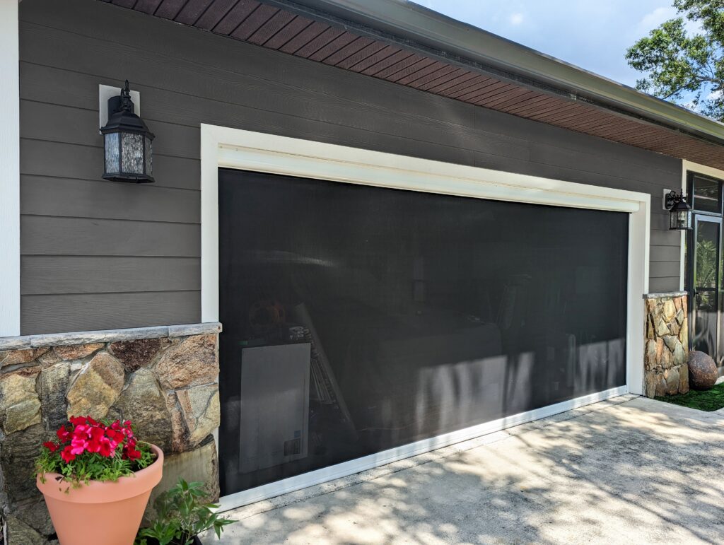 Garage screen installation on a residential home